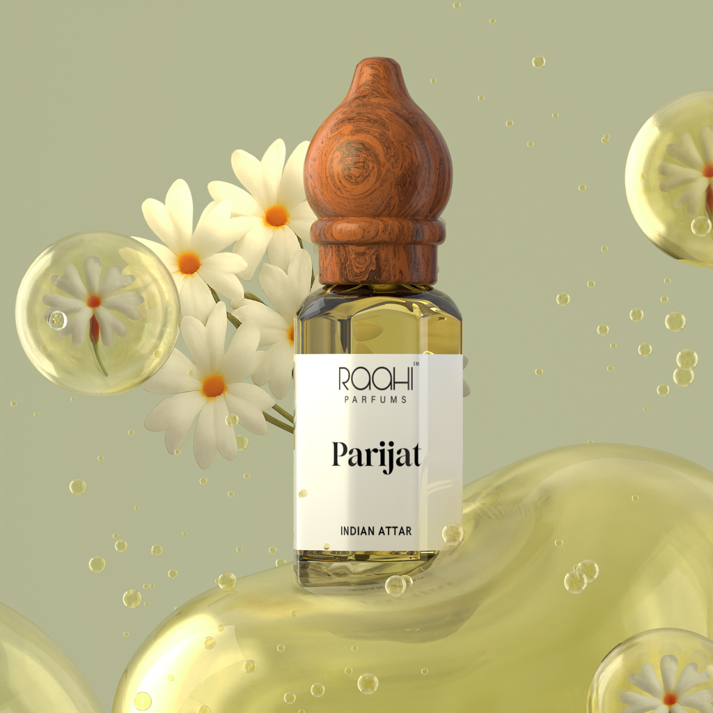 A sleek transparent glass bottle of amber parijat attar with a carved wooden stopper by roahi parfums from Kannauj
