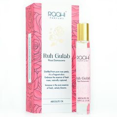 Pink rose-scented roll-on perfume bottle with gold cap and clear glass body branded ruh gulab by raahi parfums 12ml