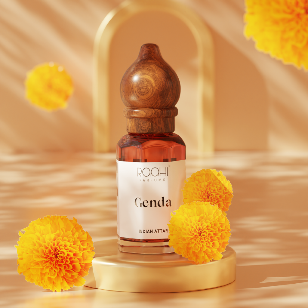 A sleek amber glass bottle with a polished wooden stopper labeled genda indian attar by raahi parfums handcrafted fragrance